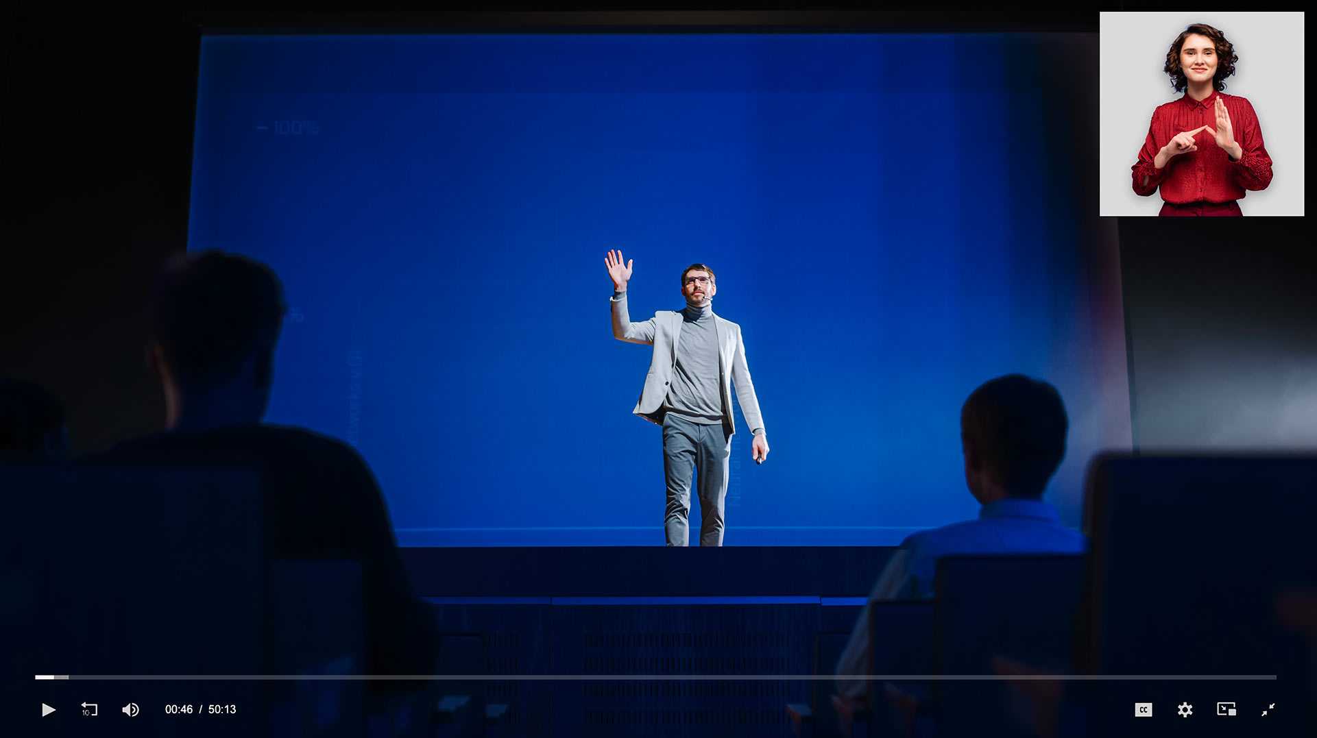 Image représentant la fonctionnalité LSQ (langage des signes du Québec) Homme devant un écran bleu