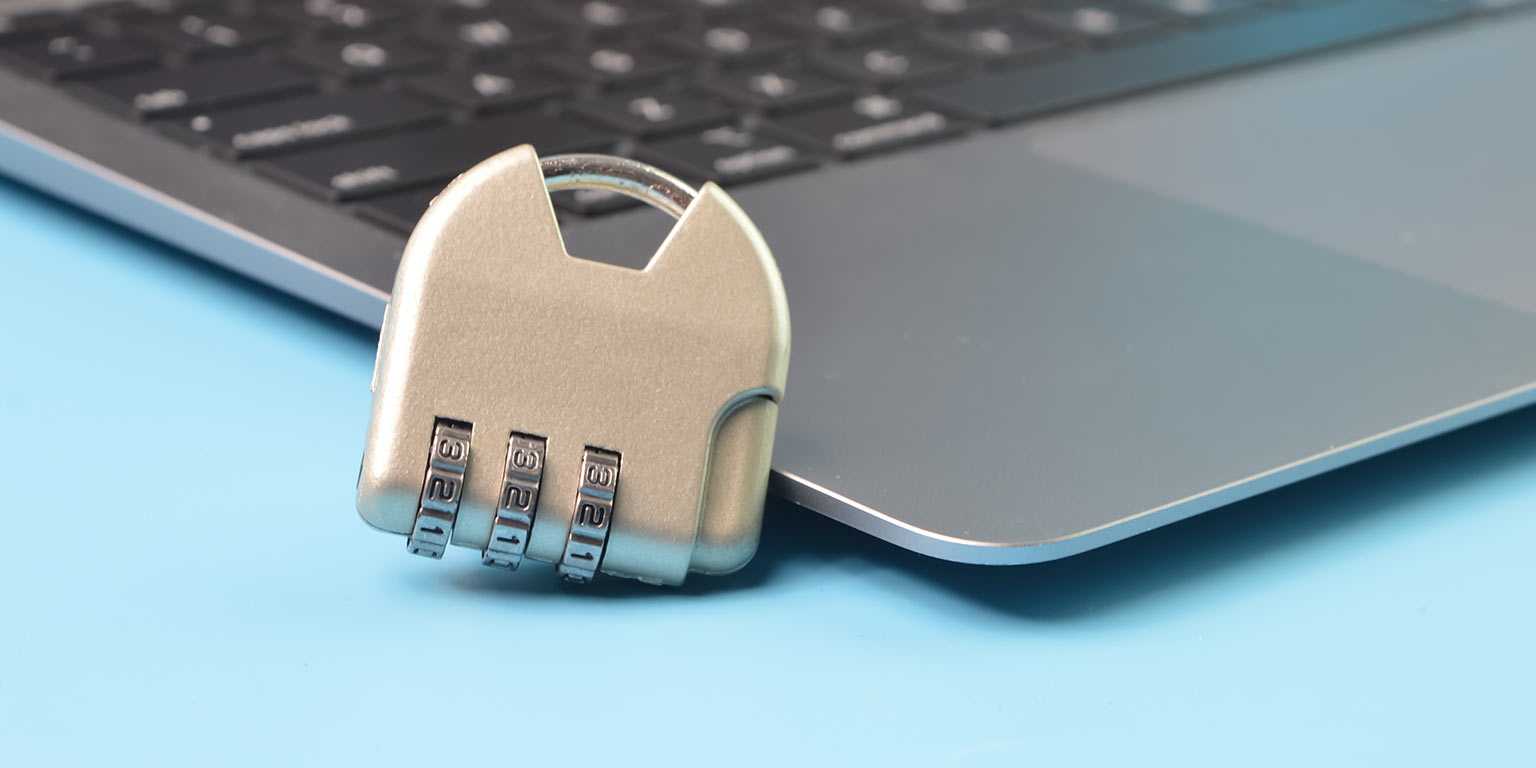 A laptop with a padlock representing access management and data protection techniques for webinars.